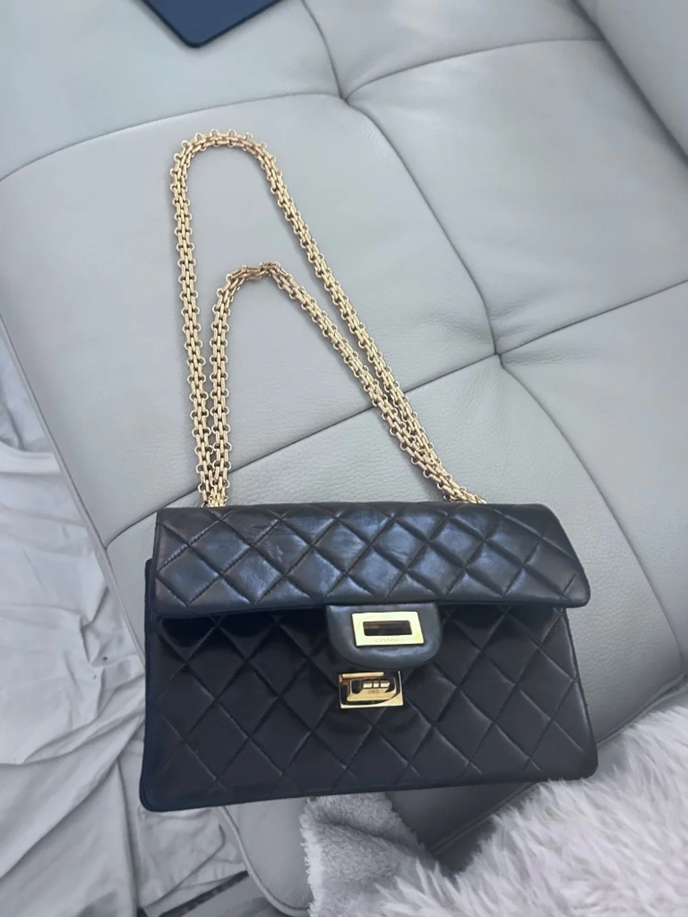 Chanel 2.55 flap bag, black calfskin and gold hardware